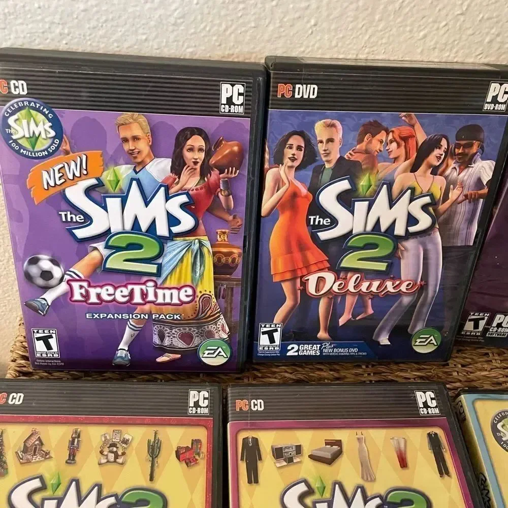 The SIMS PlayStation Vintage Side Video Game Lot PC DVD Pets Family Delux Sets